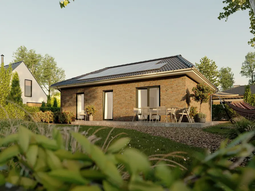 Gartenansicht des Bungalow 78 mit Klinkerfassade und Terrasse
